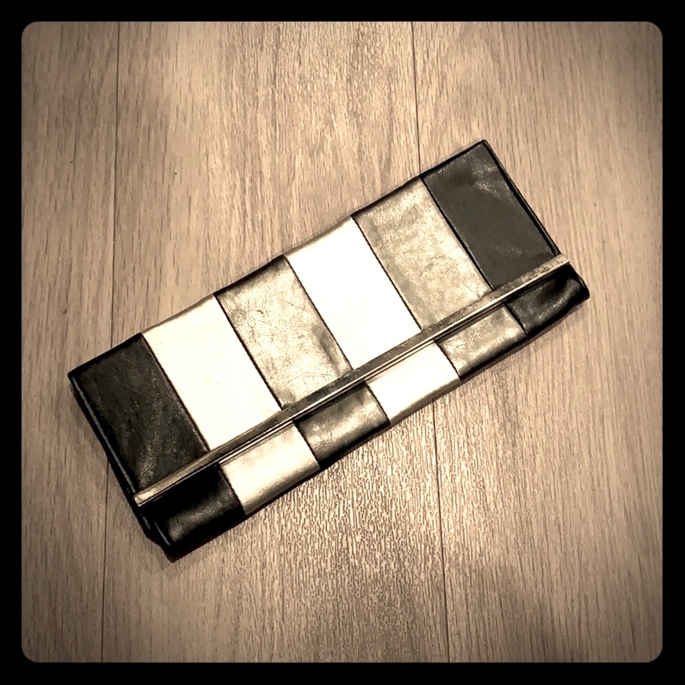 Grey and silver striped clutch hand bag